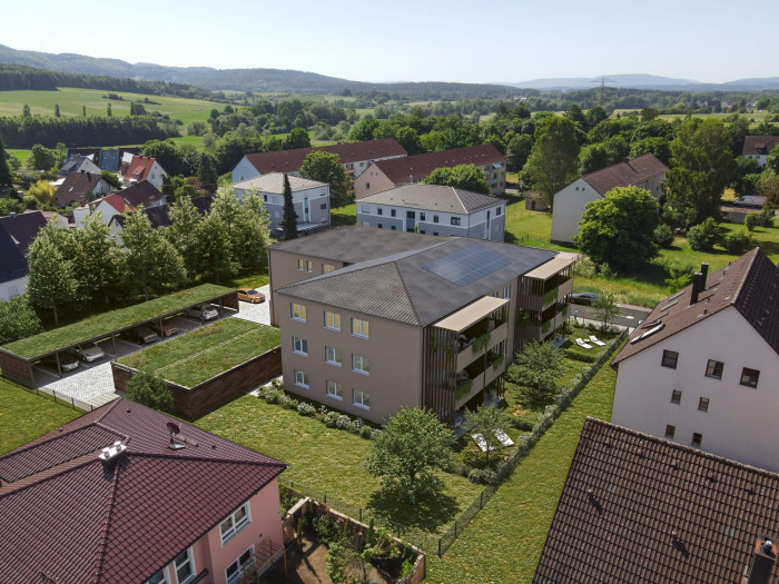 Luftansicht des geplanten Wohngebäudes mit Stellplätzen in Schnaittach